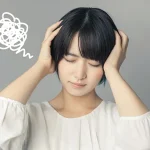 悩む女性