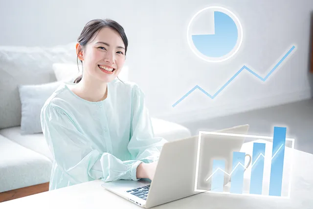 右肩上がりのグラフと女性